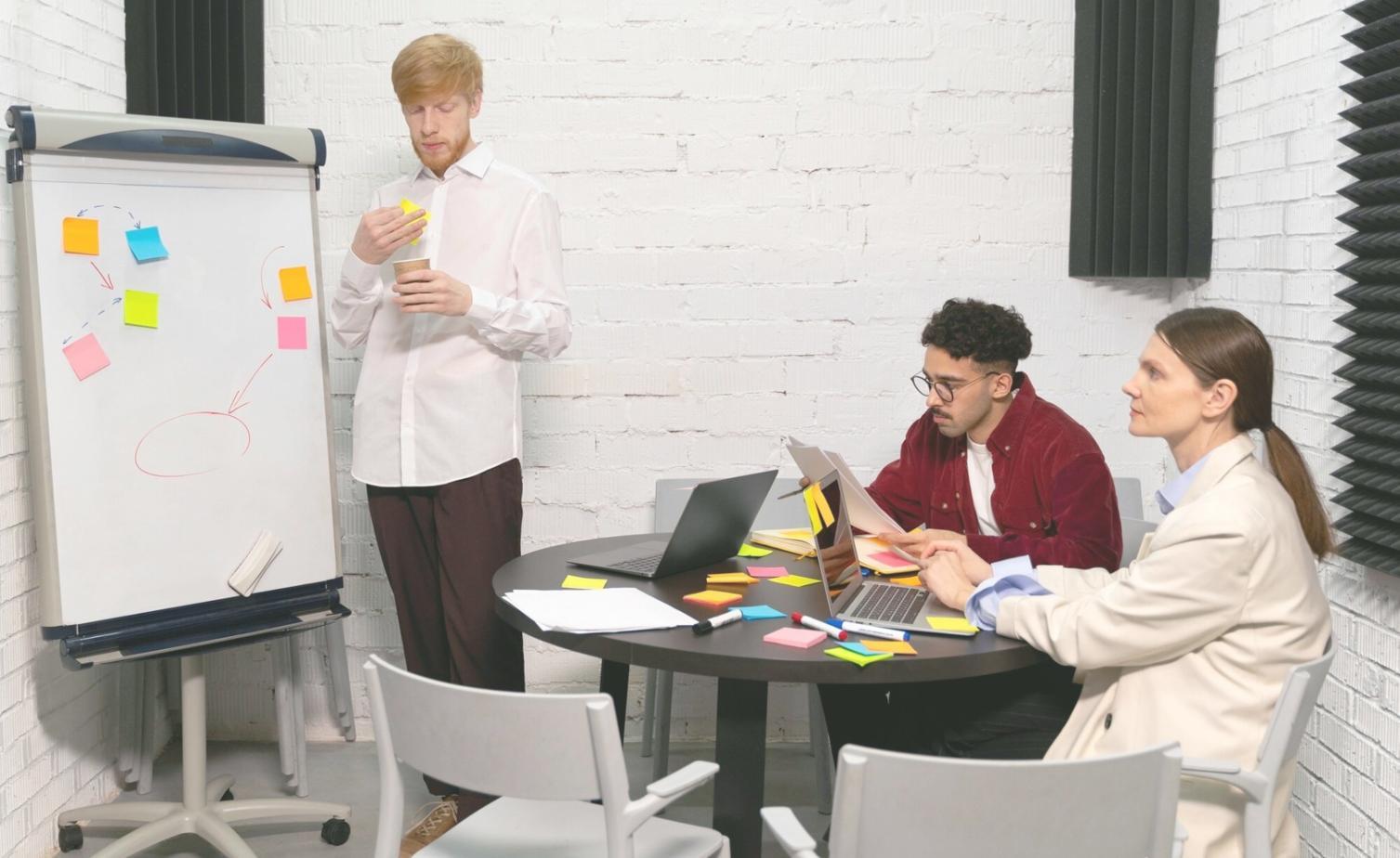 Business professionals reviewing regional market analysis and financial data